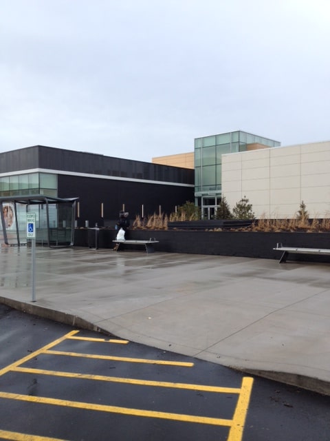 Norstone Lynia Interlocking Tiles in Ebony Basalt color used on the facade of a modern retail mall outside of Minneapolis, MN